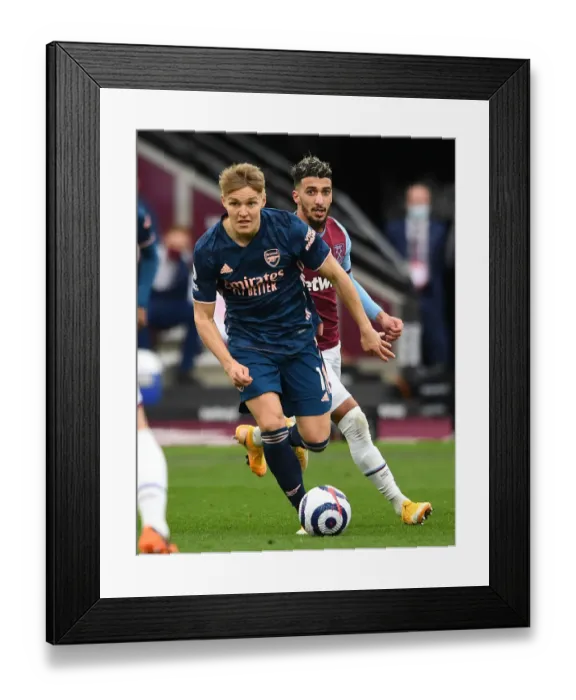 Framed Print : Martin Odegaard vs Said Benrahma: Battle in the Premier League - West Ham United vs Arsenal Framed Print : Martin Odegaard vs Said Benrahma: Battle in the Premier League - West Ham United vs Arsenal
