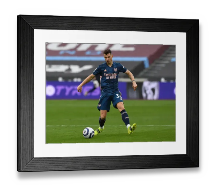 Framed Print : Granit Xhaka: In Action for Arsenal Against West Ham United, Premier League 2020-21
