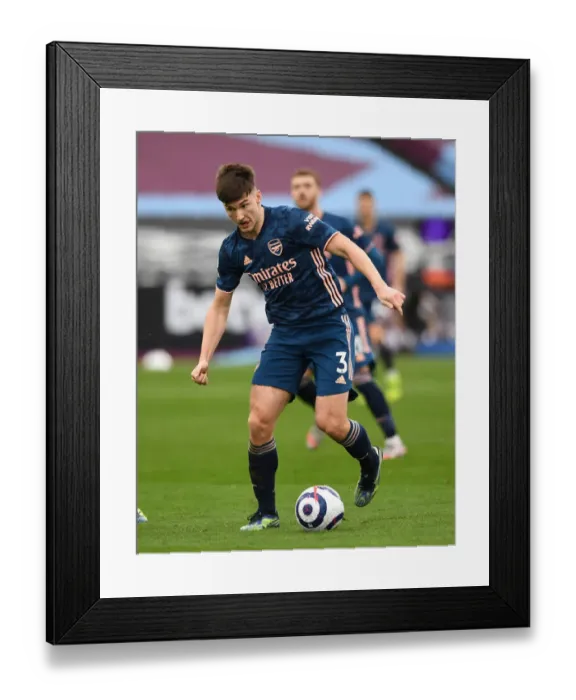 Framed Print : Arsenal's Kieran Tierney in Action during Premier League Clash against West Ham United