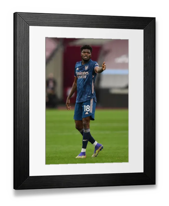 Framed Print : Thomas Partey in Action: Arsenal vs. West Ham United, Premier League 2020-21 Framed Print : Thomas Partey in Action: Arsenal vs. West Ham United, Premier League 2020-21