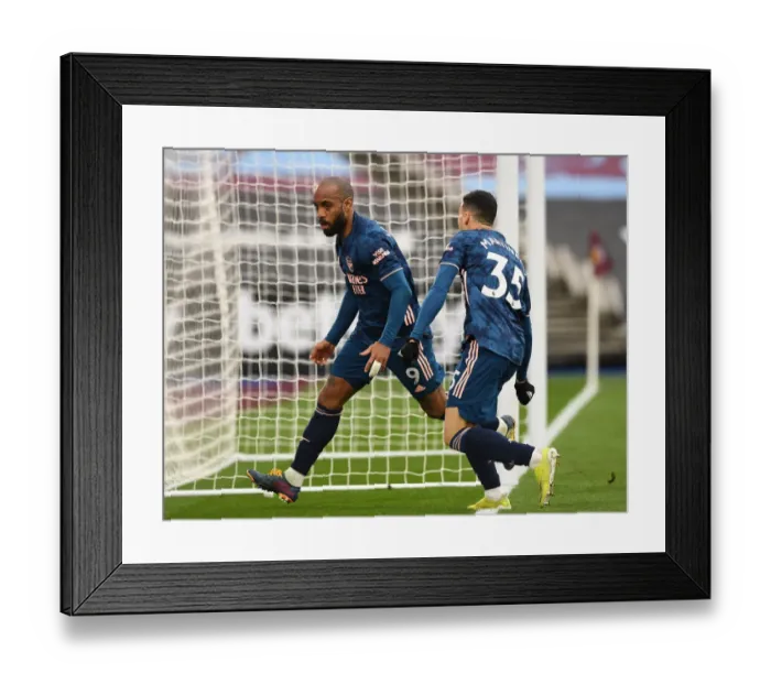 Framed Print : Alexandre Lacazette's Hat-Trick: Arsenal Crushes West Ham United in Premier League Showdown