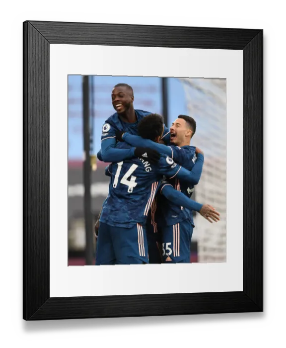 Framed Print : Arsenal's Star Forwards: Lacazette, Pepe, Aubameyang, and Martinelli Celebrate Goals Against West Ham Framed Print : Arsenal's Star Forwards: Lacazette, Pepe, Aubameyang, and Martinelli Celebrate Goals Against West Ham