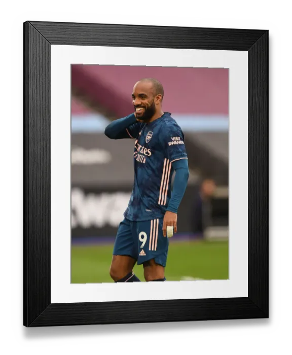Framed Print : Alexandre Lacazette's Thrilling Strike: Arsenal's Gamechanger in Premier League Clash vs West Ham United Framed Print : Alexandre Lacazette's Thrilling Strike: Arsenal's Gamechanger in Premier League Clash vs West Ham United