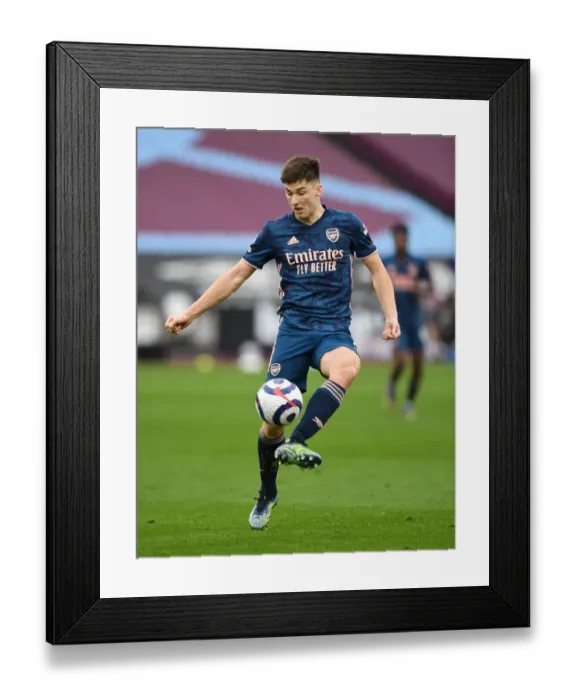 Framed Print : Arsenal's Kieran Tierney in Action Against West Ham United - Premier League 2020-21
