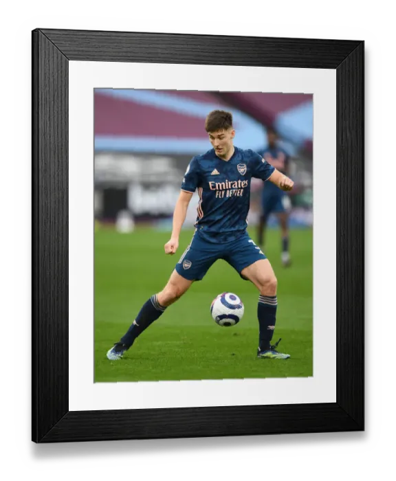 Framed Print : Arsenal's Kieran Tierney in Action Against West Ham United during Premier League Clash Framed Print : Arsenal's Kieran Tierney in Action Against West Ham United during Premier League Clash