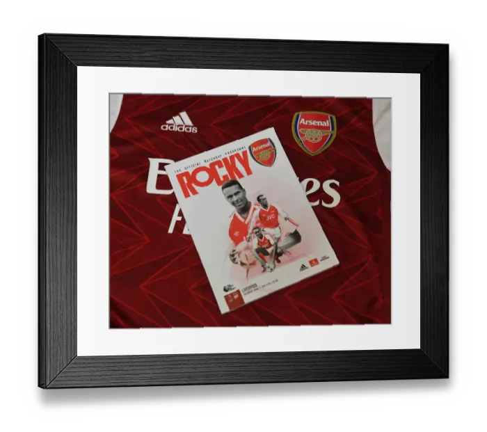 Framed Print : Arsenal Honors Late Legend Rocastle: Empty Emirates Stands for Arsenal vs Liverpool Match (2020-21) Framed Print : Arsenal Honors Late Legend Rocastle: Empty Emirates Stands for Arsenal vs Liverpool Match (2020-21)