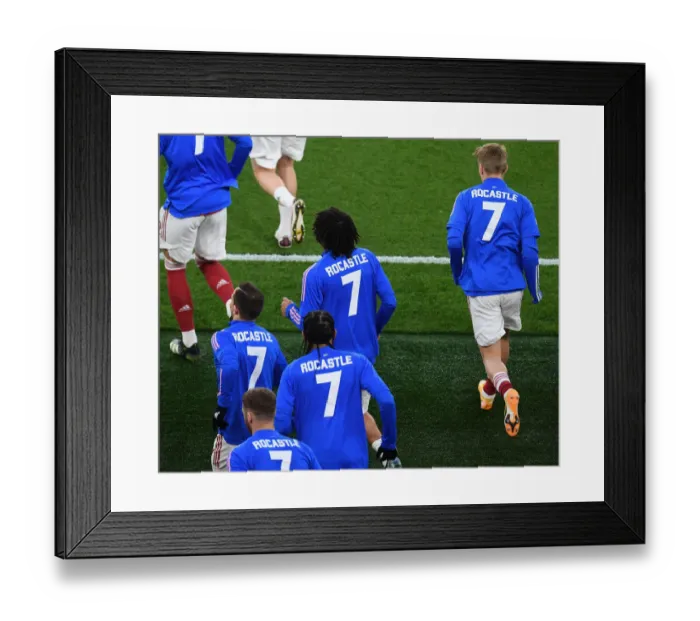 Framed Print : Arsenal Pays Tribute to Late Legend Rocastle with Empty Emirates Stadium Shirts vs Liverpool (2021) Framed Print : Arsenal Pays Tribute to Late Legend Rocastle with Empty Emirates Stadium Shirts vs Liverpool (2021)