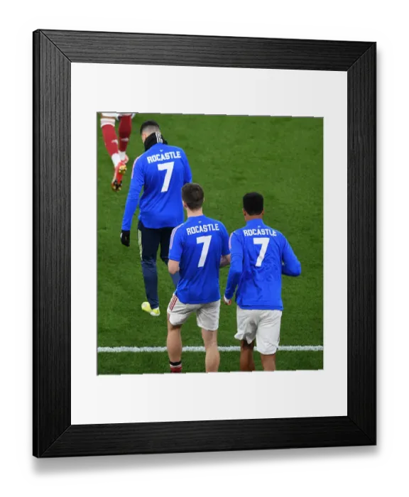 Framed Print : Arsenal Players Honor Late Legend Rocastle with Empty Emirates Stadium Shirts against Liverpool Framed Print : Arsenal Players Honor Late Legend Rocastle with Empty Emirates Stadium Shirts against Liverpool