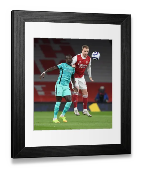Framed Print : Arsenal vs. Liverpool: Clash of Titans in Empty Emirates Stadium, Premier League 2021 Framed Print : Arsenal vs. Liverpool: Clash of Titans in Empty Emirates Stadium, Premier League 2021