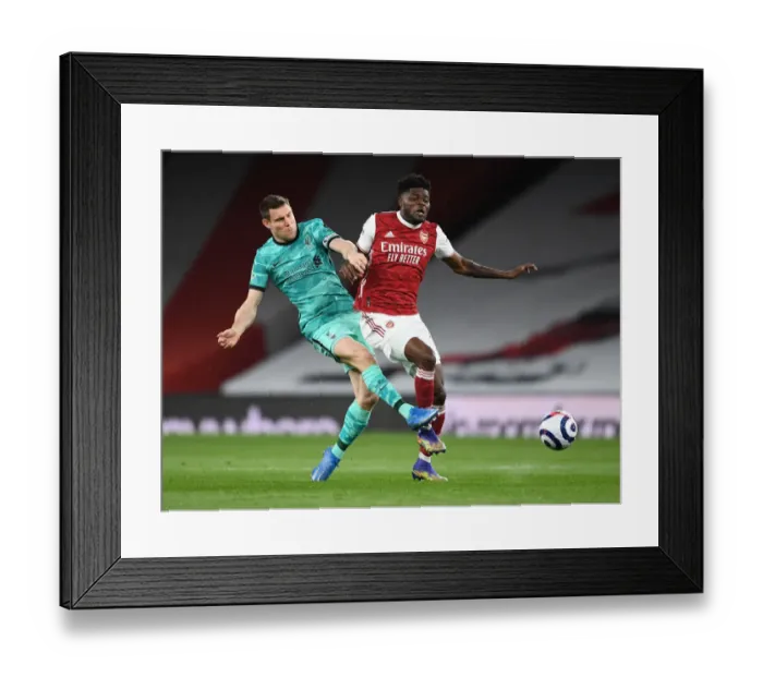 Framed Print : Thomas Partey vs. James Milner: A Battle of Midfield Titans at Empty Emirates - Arsenal vs. Liverpool (2020-21)