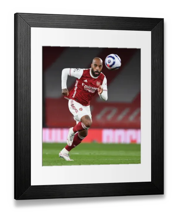 Framed Print : Empty Battle: Arsenal vs Liverpool at the Ghostly Emirates Stadium, April 2021