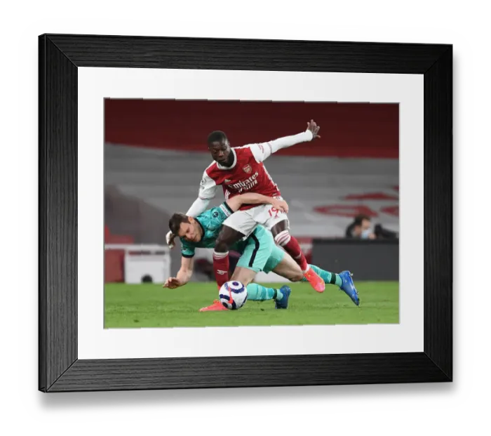 Framed Print : Pepe vs. Milner: Empty Emirates Rivalry - Arsenal vs. Liverpool (2020-21) Premier League Clash Framed Print : Pepe vs. Milner: Empty Emirates Rivalry - Arsenal vs. Liverpool (2020-21) Premier League Clash