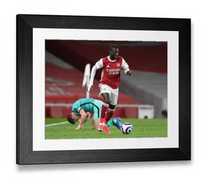 Framed Print : Arsenal vs. Liverpool: A Head-to-Head Battle in Empty Emirates Stadium (2020-21)
