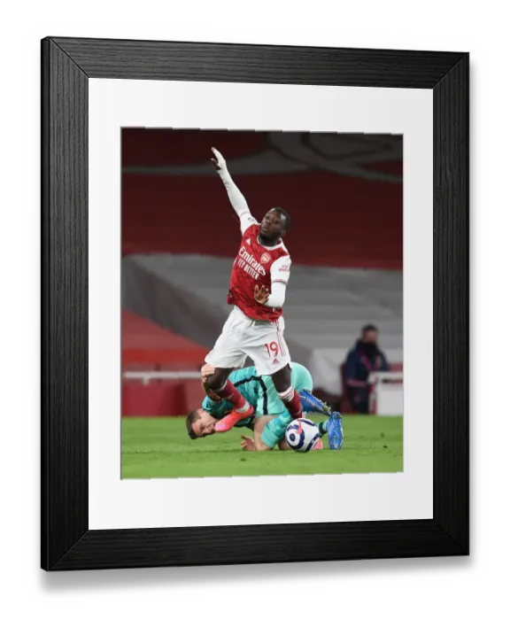 Framed Print : Arsenal vs. Liverpool: Pepe vs. Milner in Empty Emirates Stadium, Premier League Showdown (2020-21)