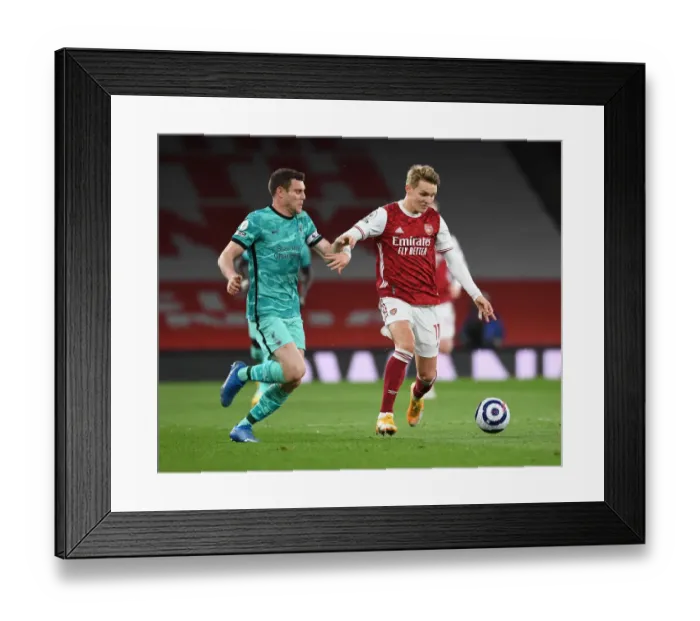 Framed Print : Arsenal vs. Liverpool: A Battle at Emirates Stadium Amidst Pandemic Restrictions Framed Print : Arsenal vs. Liverpool: A Battle at Emirates Stadium Amidst Pandemic Restrictions