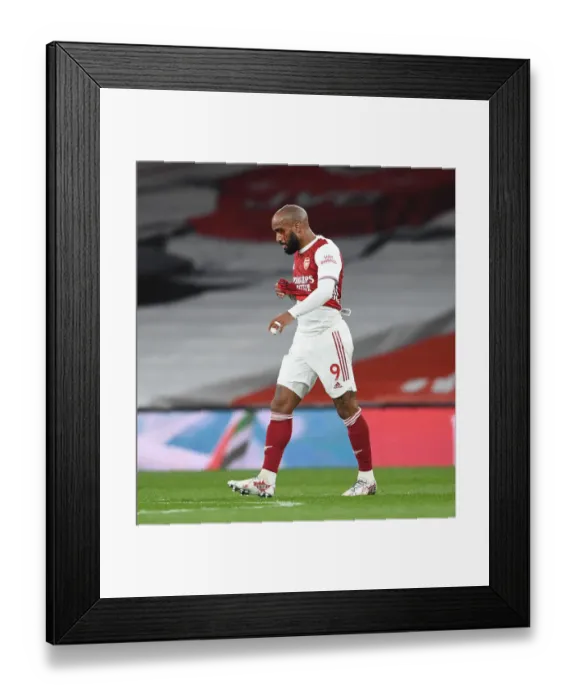 Framed Print : Alexis Lacazette Suffers Eye Injury: Arsenal vs. Liverpool (2021) - Emirates Stadium