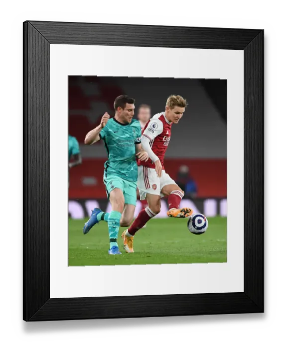 Framed Print : Arsenal vs Liverpool: A Battle at Emirates Amidst Empty Stands (2020-21)