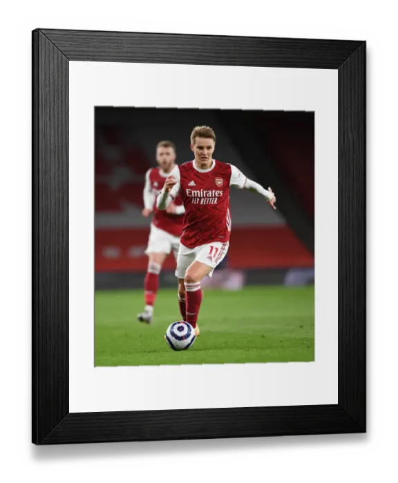 Framed Print : Arsenal vs Liverpool: Empty Emirates Showdown - Premier League Clash Amidst COVID-19 Restrictions (2021)