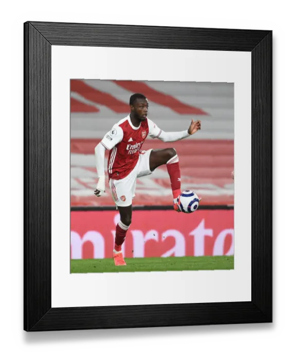 Framed Print : Arsenal vs Liverpool: Pepe in Action at Empty Emirates Stadium, Premier League 2020-21 Framed Print : Arsenal vs Liverpool: Pepe in Action at Empty Emirates Stadium, Premier League 2020-21