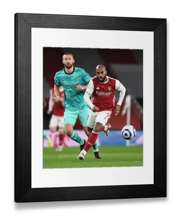 Framed Print : Arsenal's Alex Lacazette Breaks Past Liverpool's Nathaniel Phillips in Empty Emirates Stadium - Arsenal v Liverpool, 2021-22 Premier League