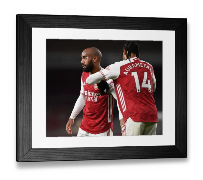 Framed Print : Arsenal's Captain Transfer: Aubameyang Passes Armband to Lacazette during Empty Emirates Stadium Showdown (Arsenal v Liverpool, 2021)