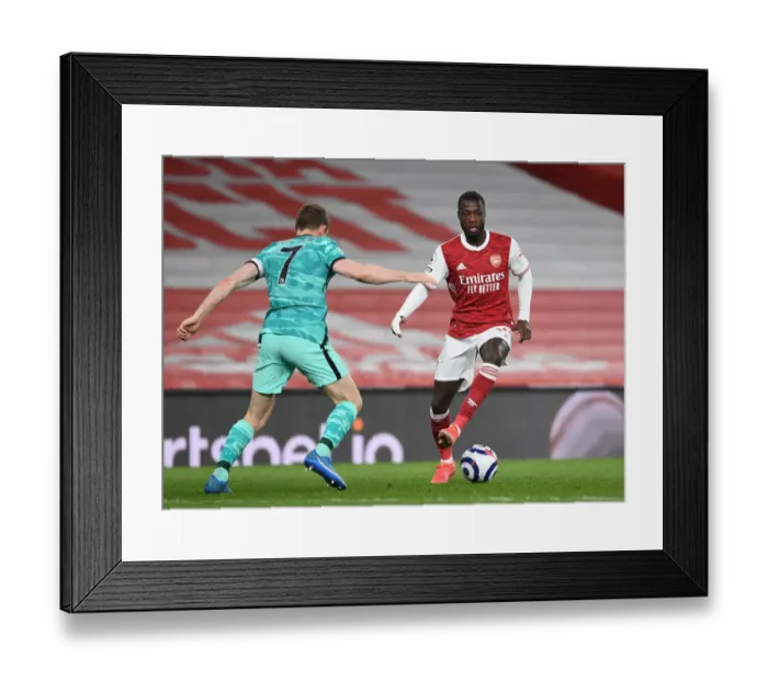 Framed Print : Behind Closed Doors: Pepe vs. Milner - Arsenal vs. Liverpool, Premier League 2021: Empty Battle