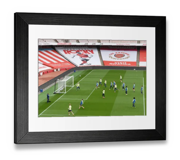 Framed Print : Arsenal Squad Training: Emirates Stadium Gears Up for Arsenal vs Liverpool, Premier League 2021 - Behind Closed Doors