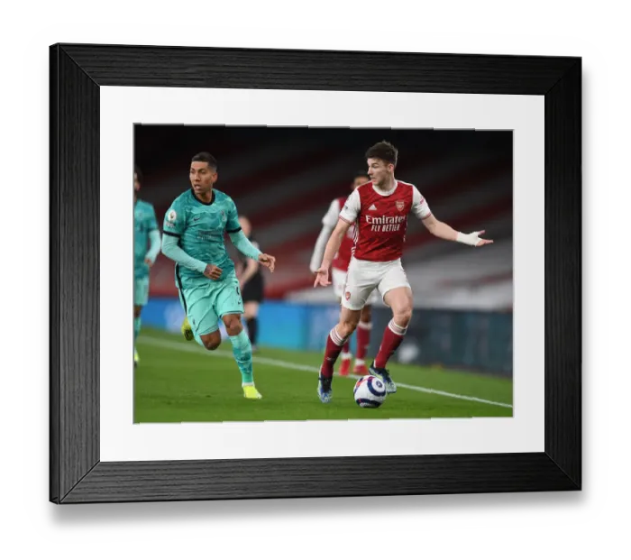 Framed Print : Arsenal vs. Liverpool Showdown: A Clash of Stars - Kieran Tierney vs. Roberto Firmino