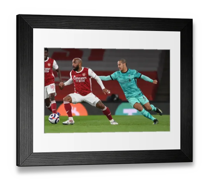 Framed Print : Lacazette vs. Thiago: The Premier League Rivalry - Arsenal vs. Liverpool Showdown (2020-21) Framed Print : Lacazette vs. Thiago: The Premier League Rivalry - Arsenal vs. Liverpool Showdown (2020-21)