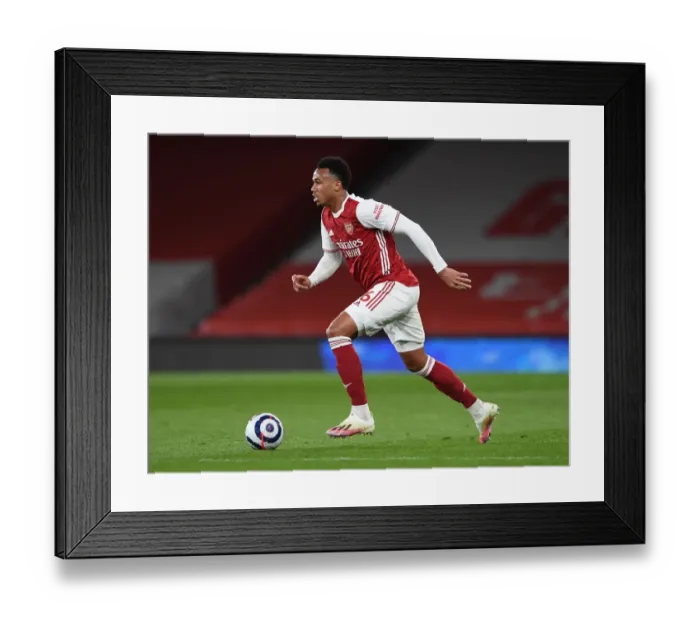 Framed Print : Arsenal's Gabriel Magalhaes Stares Down Liverpool in Intense Premier League Showdown Framed Print : Arsenal's Gabriel Magalhaes Stares Down Liverpool in Intense Premier League Showdown