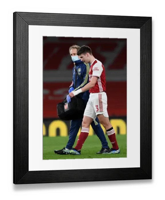 Framed Print : Arsenal's Kieran Tierney Suffers Injury Exit vs. Liverpool (2020-21) Framed Print : Arsenal's Kieran Tierney Suffers Injury Exit vs. Liverpool (2020-21)