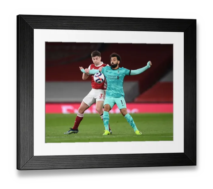 Framed Print : Tierney vs. Salah: A Premier League Showdown at Emirates Stadium - Arsenal vs. Liverpool