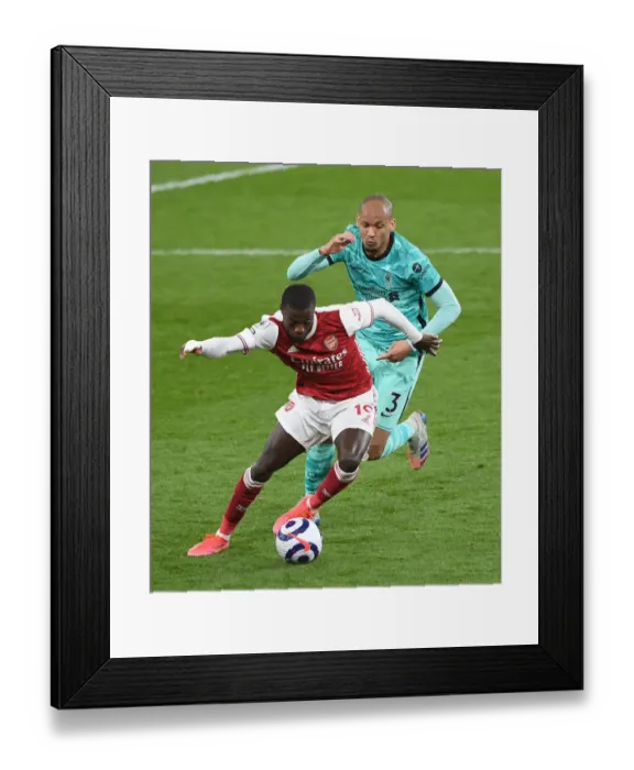 Framed Print : Arsenal vs. Liverpool: Pepe vs. Fabinho Battle in the Premier League Framed Print : Arsenal vs. Liverpool: Pepe vs. Fabinho Battle in the Premier League