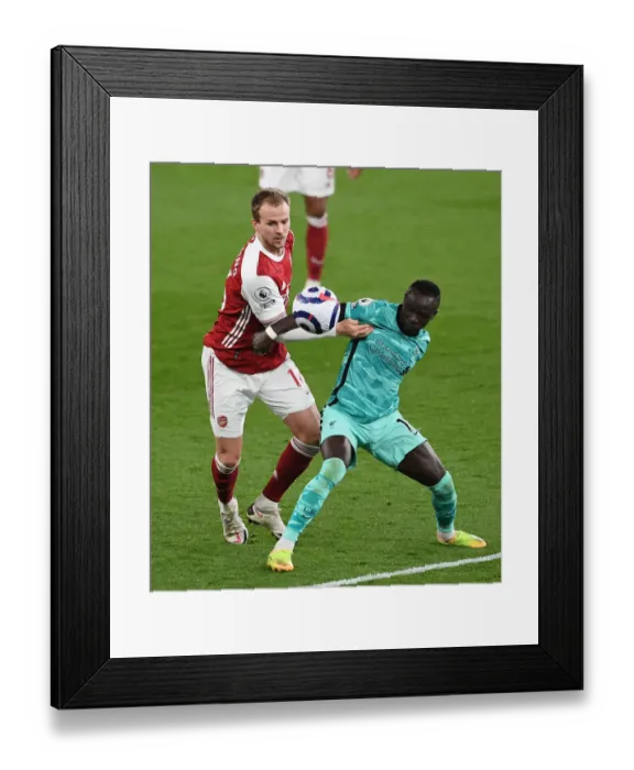 Framed Print : Clash of Titans: Arsenal vs. Liverpool - A Premier League Battle at Emirates Stadium Framed Print : Clash of Titans: Arsenal vs. Liverpool - A Premier League Battle at Emirates Stadium