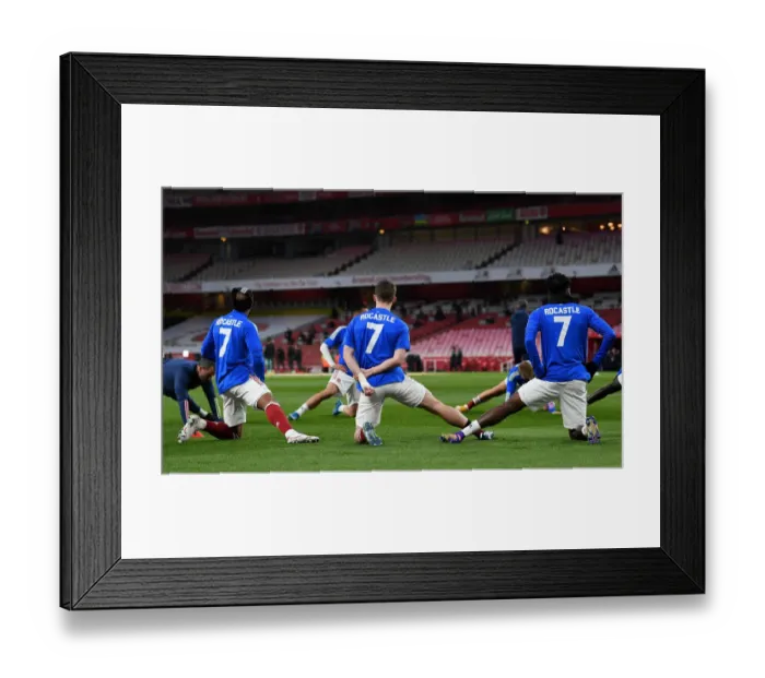 Framed Print : Arsenal Players Warm Up in David Rocastle Kits Before Arsenal vs. Liverpool (2020-21)