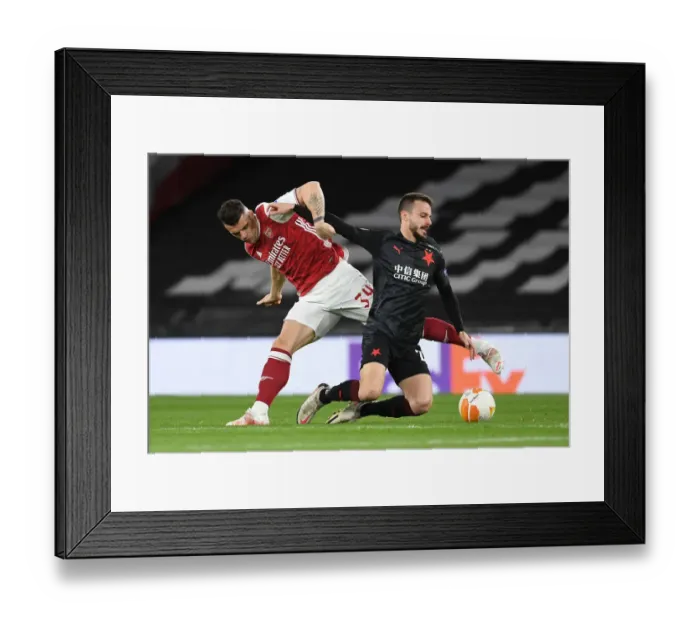 Framed Print : Arsenal vs Slavia Praha: Granit Xhaka Clashes in Empty Europa League Quarterfinal Framed Print : Arsenal vs Slavia Praha: Granit Xhaka Clashes in Empty Europa League Quarterfinal