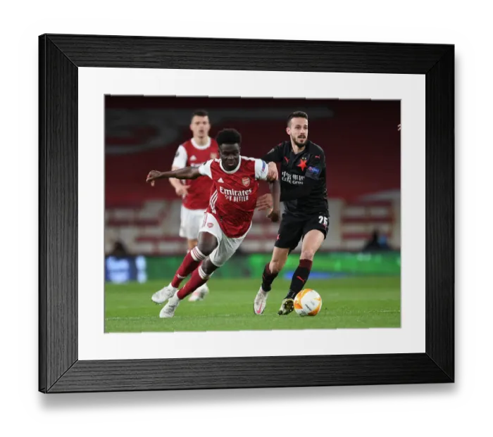 Framed Print : Arsenal's Bukayo Saka Shines in Empty Europa League Quarterfinal vs Slavia Praha Framed Print : Arsenal's Bukayo Saka Shines in Empty Europa League Quarterfinal vs Slavia Praha