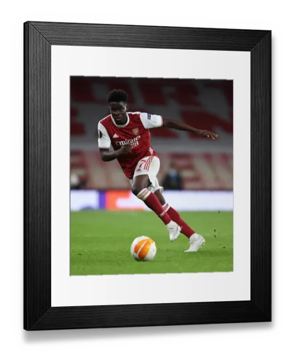 Framed Print : Arsenal's Bukayo Saka at Empty Emirates Stadium: Arsenal FC vs Slavia Praha, UEFA Europa League Quarterfinal (2021) Framed Print : Arsenal's Bukayo Saka at Empty Emirates Stadium: Arsenal FC vs Slavia Praha, UEFA Europa League Quarterfinal (2021)