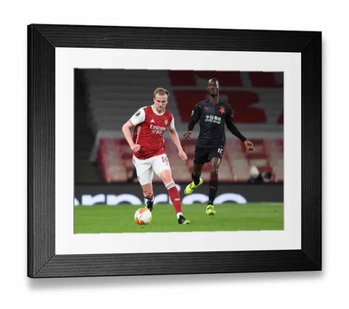 Framed Print : Arsenal vs Slavia Praha: Europa League Quarterfinal Clash in Empty Emirates Stadium