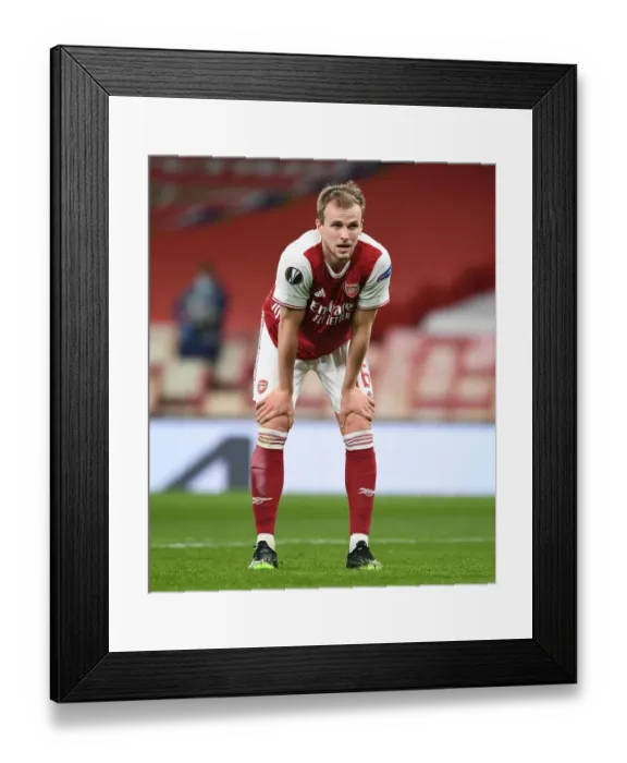 Framed Print : Rob Holding at Empty Emirates: Arsenal vs Slavia Praha, Europa League Quarterfinal Amid COVID-19 Restrictions Framed Print : Rob Holding at Empty Emirates: Arsenal vs Slavia Praha, Europa League Quarterfinal Amid COVID-19 Restrictions