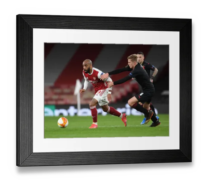 Framed Print : Arsenal's Alex Lacazette Scores Past Slavia Praha in Empty Europa League Quarterfinal Framed Print : Arsenal's Alex Lacazette Scores Past Slavia Praha in Empty Europa League Quarterfinal