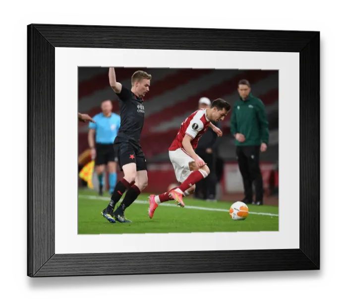 Framed Print : Arsenal vs Slavia Praha: UEFA Europa League Quarterfinal at Emirates Stadium During Pandemic - Empty Seats and Cedric vs Zima Clash Framed Print : Arsenal vs Slavia Praha: UEFA Europa League Quarterfinal at Emirates Stadium During Pandemic - Empty Seats and Cedric vs Zima Clash