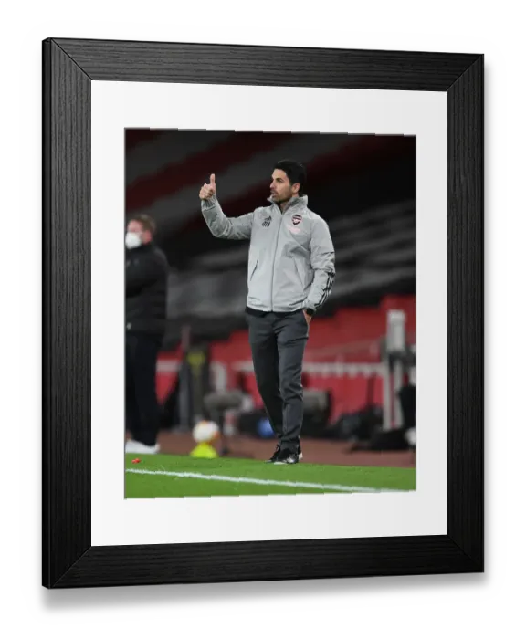 Framed Print : Arsenal FC vs Slavia Praha: Mikel Arteta Leads Gunners in Europa League Quarterfinal Amid Empty Emirates Stadium Framed Print : Arsenal FC vs Slavia Praha: Mikel Arteta Leads Gunners in Europa League Quarterfinal Amid Empty Emirates Stadium