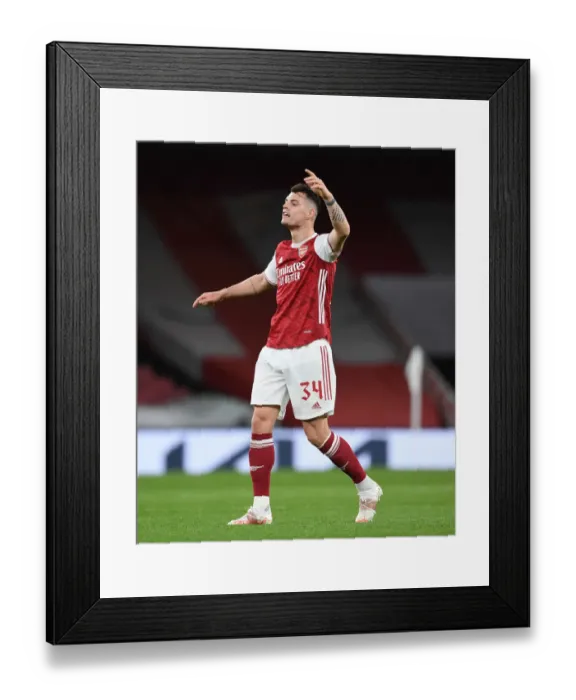 Framed Print : Empty Emirates: Granit Xhaka Plays Out Quiet Quarterfinal Against Slavia Praha Framed Print : Empty Emirates: Granit Xhaka Plays Out Quiet Quarterfinal Against Slavia Praha