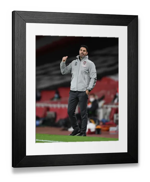 Framed Print : Mikel Arteta at Empty Emirates: Arsenal's Europa League Battle against Slavia Praha Amidst COVID-19 Restrictions