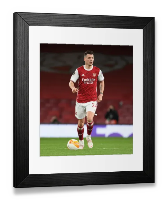 Framed Print : Arsenal's Granit Xhaka at Empty Emirates Stadium: Arsenal v Slavia Prague in UEFA Europa League Quarterfinals (April 2021) Framed Print : Arsenal's Granit Xhaka at Empty Emirates Stadium: Arsenal v Slavia Prague in UEFA Europa League Quarterfinals (April 2021)