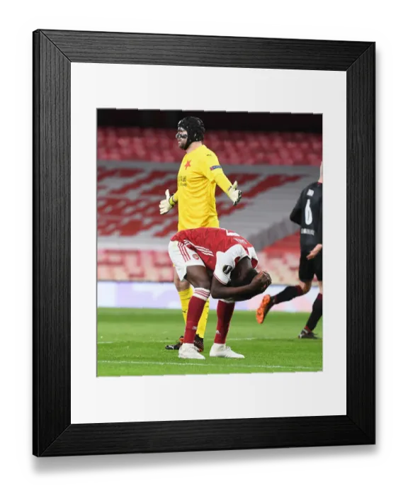Framed Print : Arsenal's Bukayo Saka in UEFA Europa League Quarterfinal vs Slavia Praha at Emirates Stadium (Behind Closed Doors) Framed Print : Arsenal's Bukayo Saka in UEFA Europa League Quarterfinal vs Slavia Praha at Emirates Stadium (Behind Closed Doors)