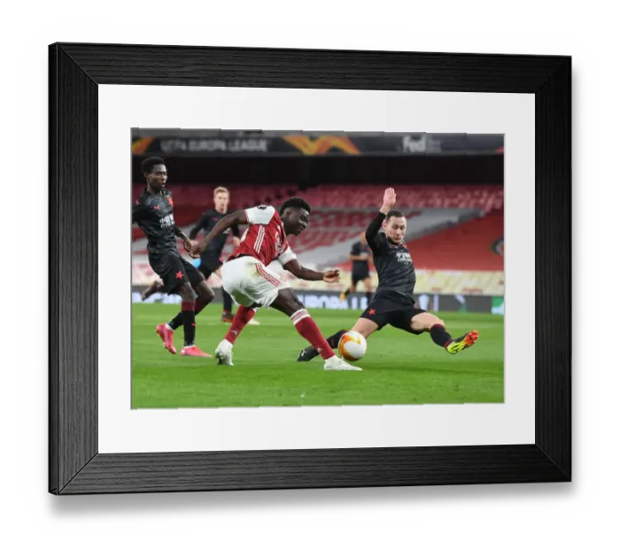 Framed Print : Arsenal vs Slavia Praha: Bukayo Saka Faces Off in Empty Europa League Quarterfinal Framed Print : Arsenal vs Slavia Praha: Bukayo Saka Faces Off in Empty Europa League Quarterfinal