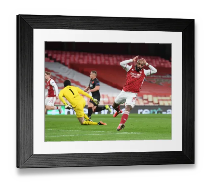 Framed Print : Arsenal's Lacazette Hits the Crossbar in Europa League Quarterfinal vs Slavia Praha (Behind Closed Doors) Framed Print : Arsenal's Lacazette Hits the Crossbar in Europa League Quarterfinal vs Slavia Praha (Behind Closed Doors)
