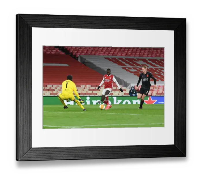 Framed Print : Pepe's Chip: Arsenal's Europa League Goal in Empty Emirates Stadium